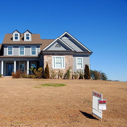 house with for sale sign